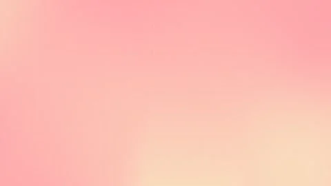 Soft pink gradient with subtle grain texture, blending into warm beige. Seamless Vídeo Stock 309058586