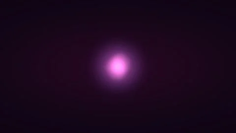 Soft pink light glowing against a dark background in motion Stock Footage 336995084