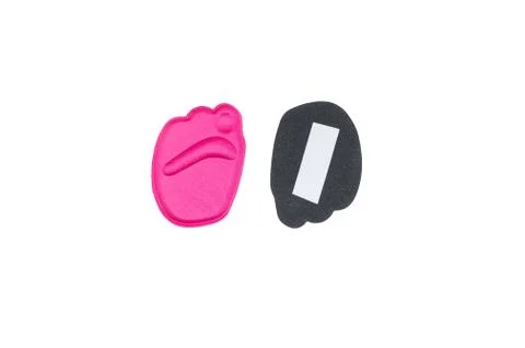Soft pink orthopedic insert for the forefoot under fingers in shoes isolated  Stock Photos
