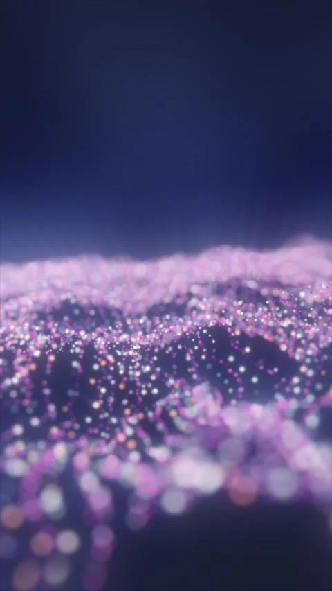 Soft pink, purple, and white particles form rolling abstract waves with del.. Stock Footage 345424797