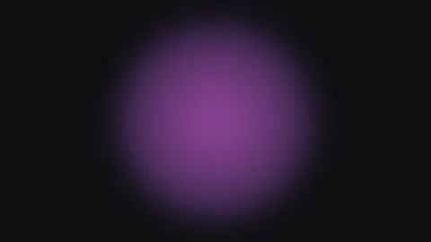 A soft purple radial gradient glow fading into a deep solid black background Stock Footage 339617467