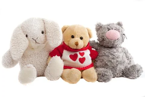 Soft rabbit, bear and a cat Stock Photos