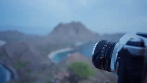 Soft rack focus portrait of young woman make photo adjustments on old vintage Video stock 261346875