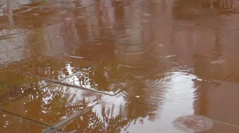 Soft rain drops falling on terrace floor Stock Footage 11021256