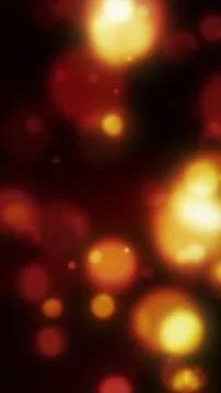 Soft red and orange glowing circles create a warm defocused bokeh backgroun.. Stock Illustration