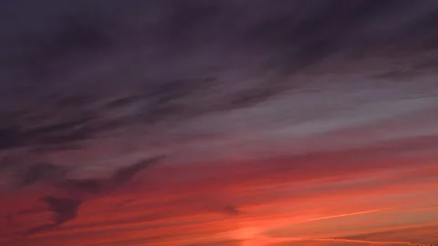 Soft Red and Orange Sunset Clouds Stock Footage 318195875