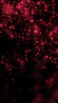 Soft red bokeh lights and floating glitter particles on a dark background, cr Stock Illustration