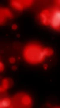Soft red glowing bokeh circles on a dark background, creating a moody abstr.. 스톡 일러스트