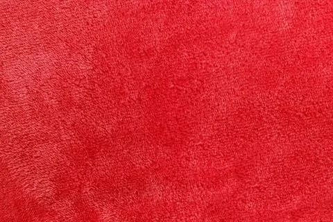 Soft red micro fleece blanket background Stock Photos