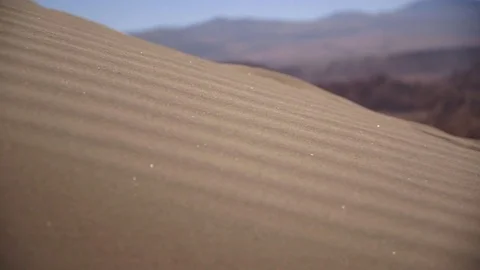 Soft ripples of sand formed on a desert land Stock Footage 79786151