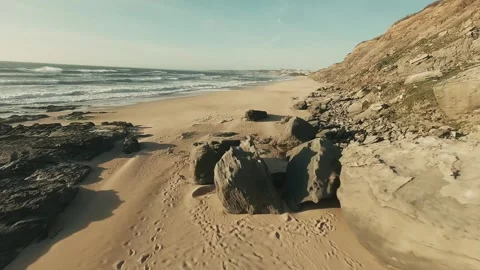 Soft sand trails lead toward waves Stock Footage 341827048