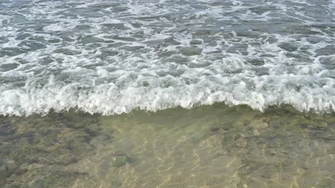 Soft sea water waves on the sandy beach. Stock Footage 221137631
