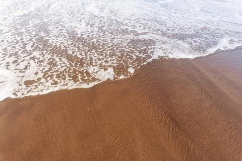 Soft sea Wave On Sandy Beach. Summer and vacations and travel concept. Sel... Stock-Fotos