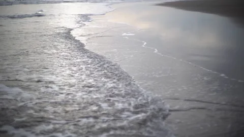 Soft sea waves rolling onto sandy beach Stock Footage 328633592
