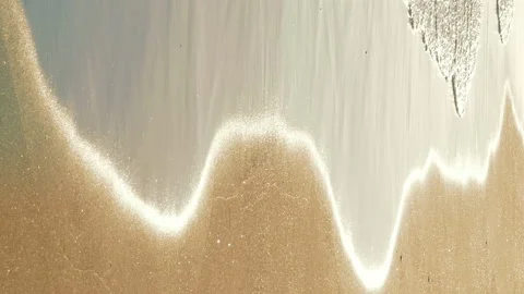 Soft sea waves rushing on sandy beach on sunset Stock Footage 91187275