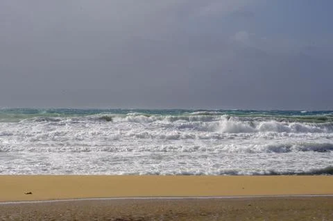 Soft Sea Waves on Sandy Beach A Tranquil Coastal Escape Close Up Serenity Stock Photos