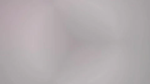 Soft, seamless light backdrop: Minimalist pastel pink studio background loop Stock Footage 333106352