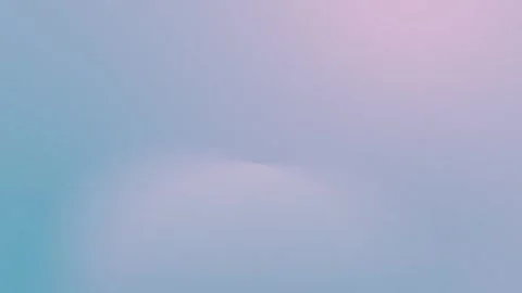 Soft seamless loop background in pastel pink and blue gradient. 4K video. Stockbeeldmateriaal 309700794