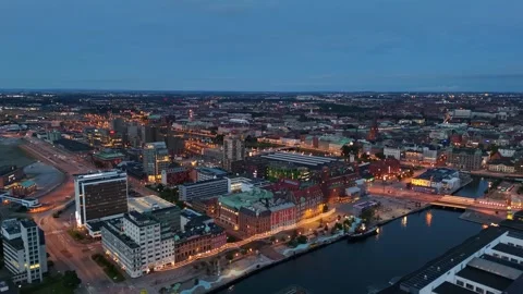 Soft shadows fall across Västra Hamnen’s boardwalk and buildings Stock Footage 340212414