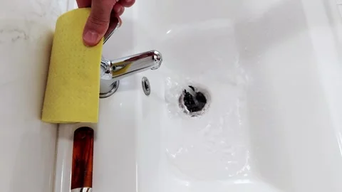 Soft Sink Light and Quiet Motion: Morning Ritual of Care Begins Vídeo Stock 313863157