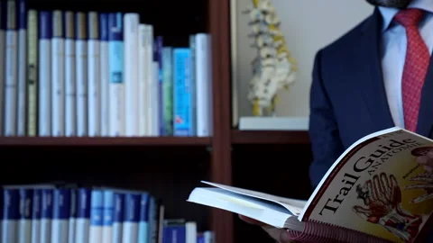 Soft Slider Movement While a Reading Medical Book Searching For Treatment  . Stock Footage 145958133