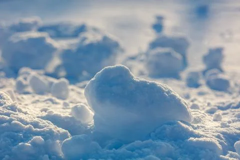 Soft snow forms delicate, rounded mounds 写真素材