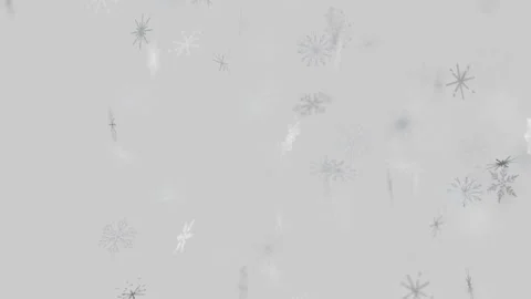 Soft snowflakes falling gently on a light gray winter background Vídeos de archivo 346243667