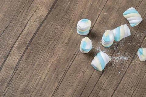 Soft spiral shape rainbow marshmallows on the ground Stock Photos