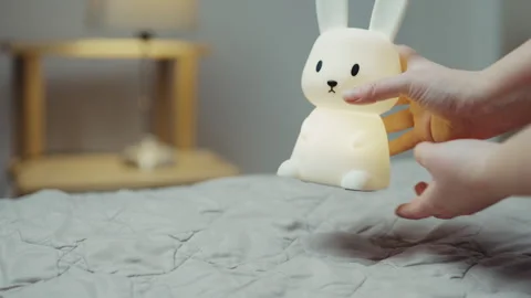 Soft squishy rabbit LED lamp, BPA-free silicone nightlight for nursery and baby  動画素材 330433836