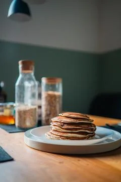 Soft Stack of Delicious Pancakes on a White Plate for Breakfast on a Wooden.. Stock Photos
