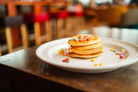 Soft Stack of Pancakes with Colorful Topping Decoration Stock Photos