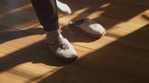 Soft Steps Meet Light as Morning Feet Find Warm Slippers Retreat Video stock 323910854