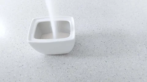 Soft Sugar Pour: A Gentle Cascade into Minimalist Ceramic Calm Stock Footage 315845048