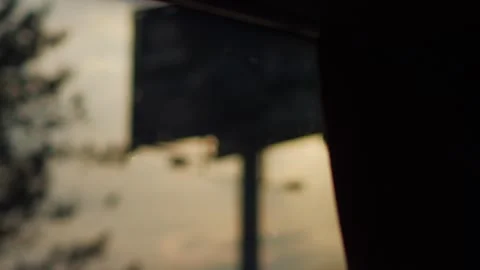 Soft sunbeams through clouds on a calm evening in 4k slow motion 120fps Stock Footage 267694459