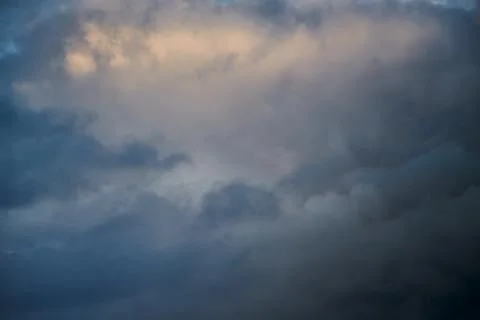 Soft sunlight on the clouds in the sky Stock Photos