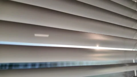 Soft Sunlight Filtering Through Modern White Blinds Stock Footage 263927959