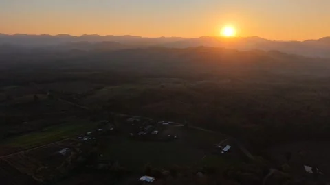 Soft Sunlight Over Calm Mountain Ranges Stock Footage 326176700