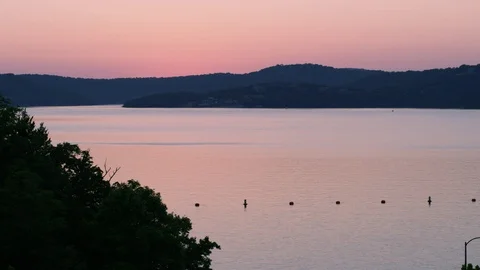 A Soft Sunlight Reflects Off A Lake Stock Footage 87397099