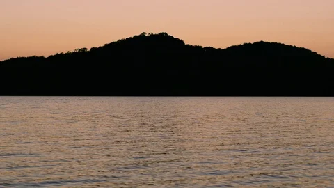 A Soft Sunlight Reflects Off A Lake Stock Footage 87397125