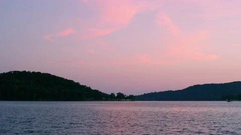 A Soft Sunlight Reflects Off A Lake Stock Footage 87397134