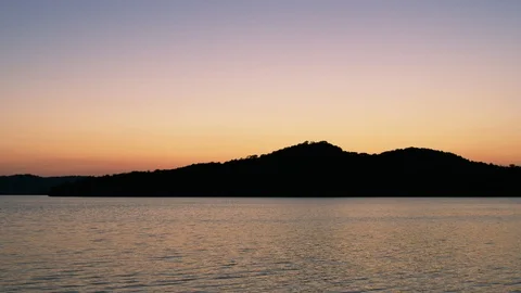 A Soft Sunlight Reflects Off A Lake Stock Footage 87397153