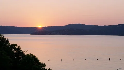 A Soft Sunlight Reflects Off A Lake Stock Footage 87397166