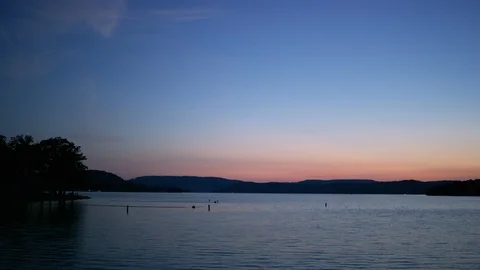 A Soft Sunlight Reflects Off A Lake Stock Footage 87397182