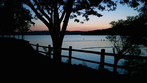 A Soft Sunlight Reflects Off A Lake Stock Footage 87397214