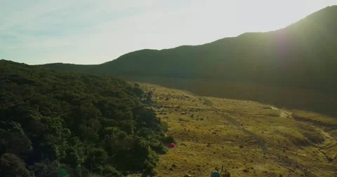 Soft Sunset Light Over Mountain Range with Fog Indonesia Aerial Landscape Stock Footage 331872769