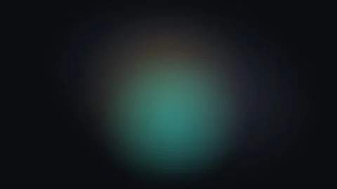 A soft teal and brown gradient light glow against a deep black background Видео 338309660