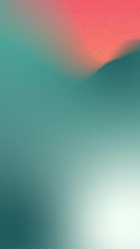 Soft teal and pink gradient blur with subtle grain texture. Seamless loop Stock Footage 309701358