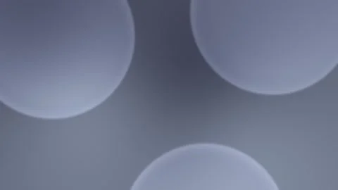 Soft teal gradient with blurred circular shapes. Seamless loop background. 4K. Vídeo Stock 309701169