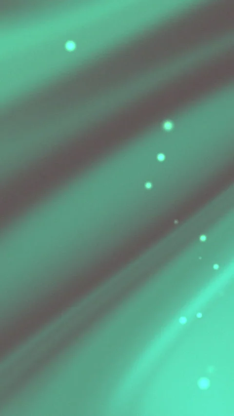 Soft teal light washes over flowing fabric Video stock 336781882