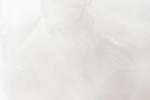 Soft texture of white mesh fabric background Stock Photos